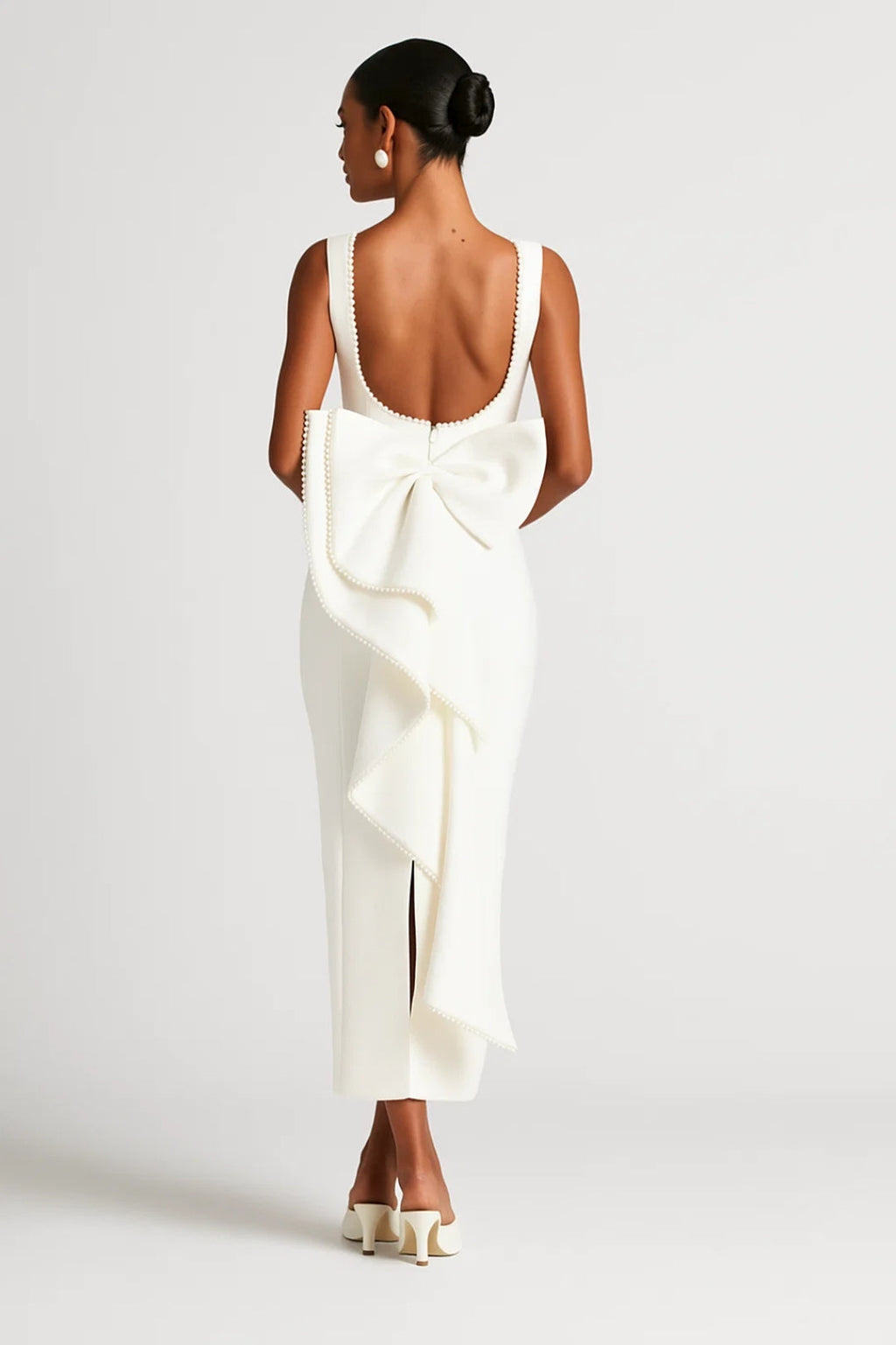 Figurbetontes Langkleid – Elegantes Rückendetail mit Schleife