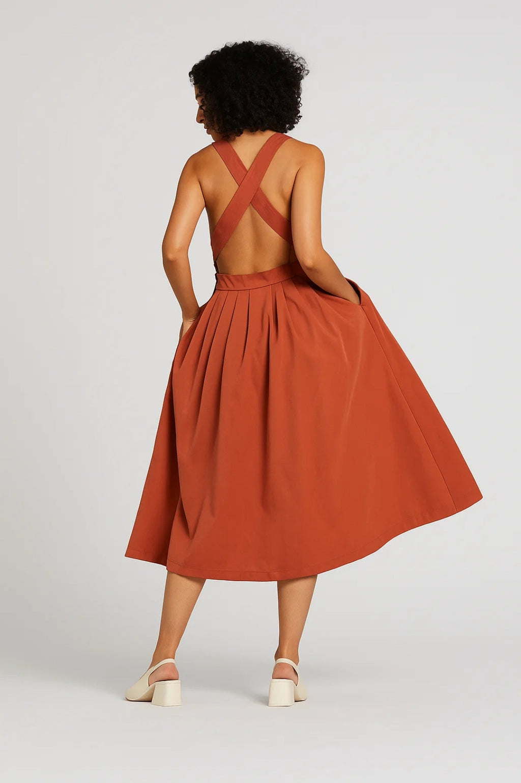 Elegantes Midi Kleid – Ärmellos mit Faltenrock für mühelosen Stil